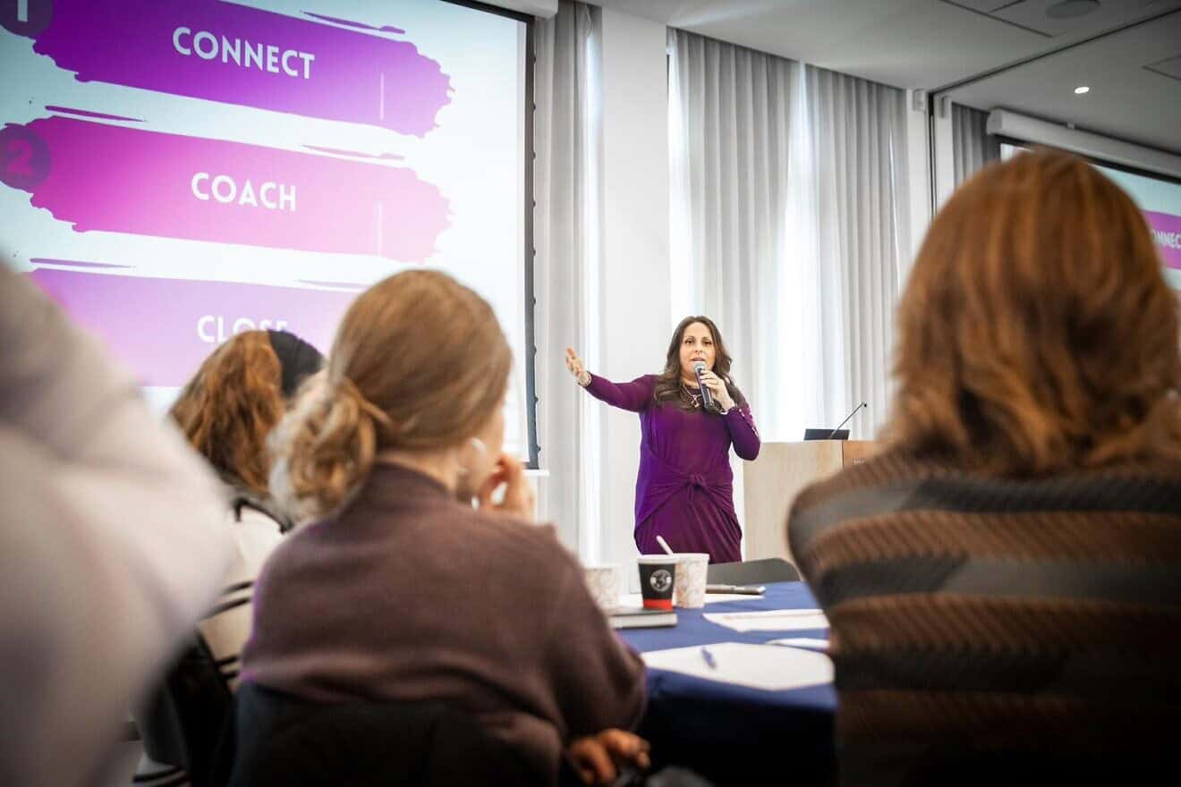 Netflix TV star Aleeza Ben Shalom addresses participants in an international matchmaking conference in Jerusalem, January 2025. Credit: Jamie Gordon Photography.