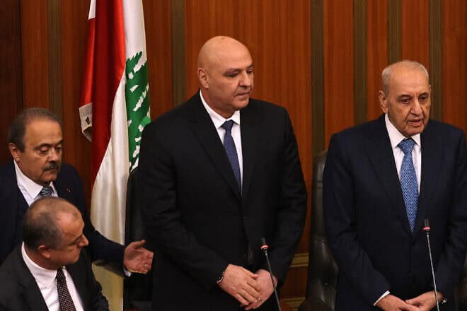 Newly elected Lebanese President Joseph Aoun (center) stands next to Parliament Speaker Nabih Berri at the legislature in Beirut on Jan. 9, 2025. Photo by Anwar Amro/AFP via Getty Images.