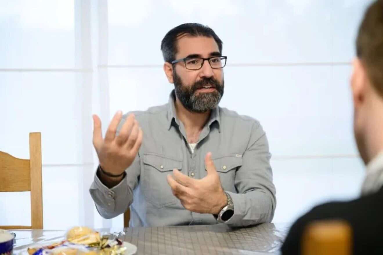 In 2016, Karim Hassoun (pictured) honored a slain Hezbollah terrorist outside the Museum and Documentation Centre on Holocaust and Human Rights in Mechelen, the site of the transit camp from where Jews and Romani in Belgium were sent to Auschwitz. Credit: European Jewish Press.