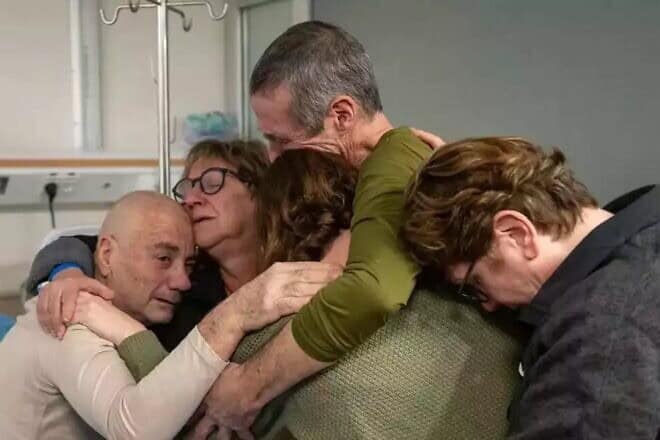 Rescued hostages Luis Har and Fernando Simon Marman reunited with their loved ones, February 2024. Credit: IDF Spokesperson's Unit.