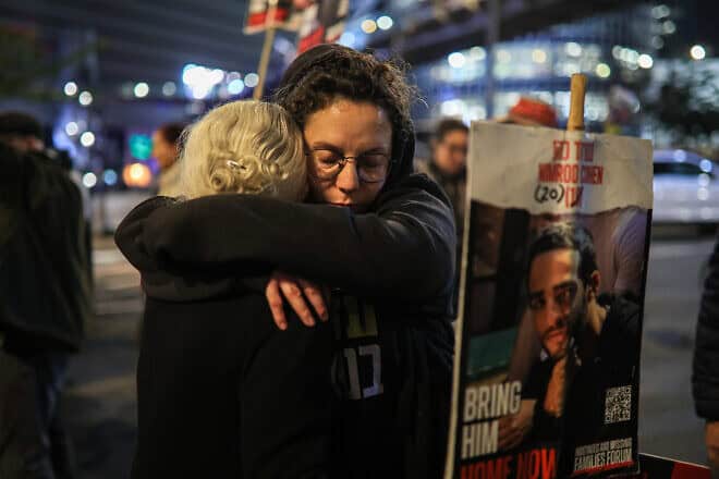 Families and supporters of the hostages in the Gaza Strip hear news of a release deal as they gather outside the Kirya military base in Tel Aviv, Jan. 15, 2025. Photo by Itai Ron/Flash90.