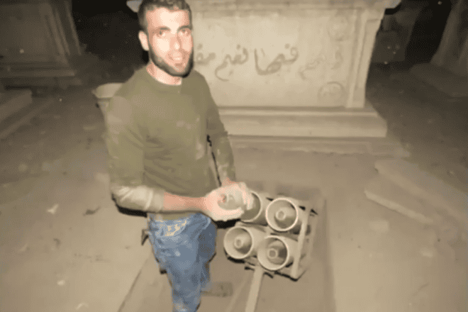 Screenshot of Hamas operatives setting up a rocket launcher in a cemetery in the Gaza Strip, on Jan. 14, 2025. Source: IDF Spokesperson's Office.