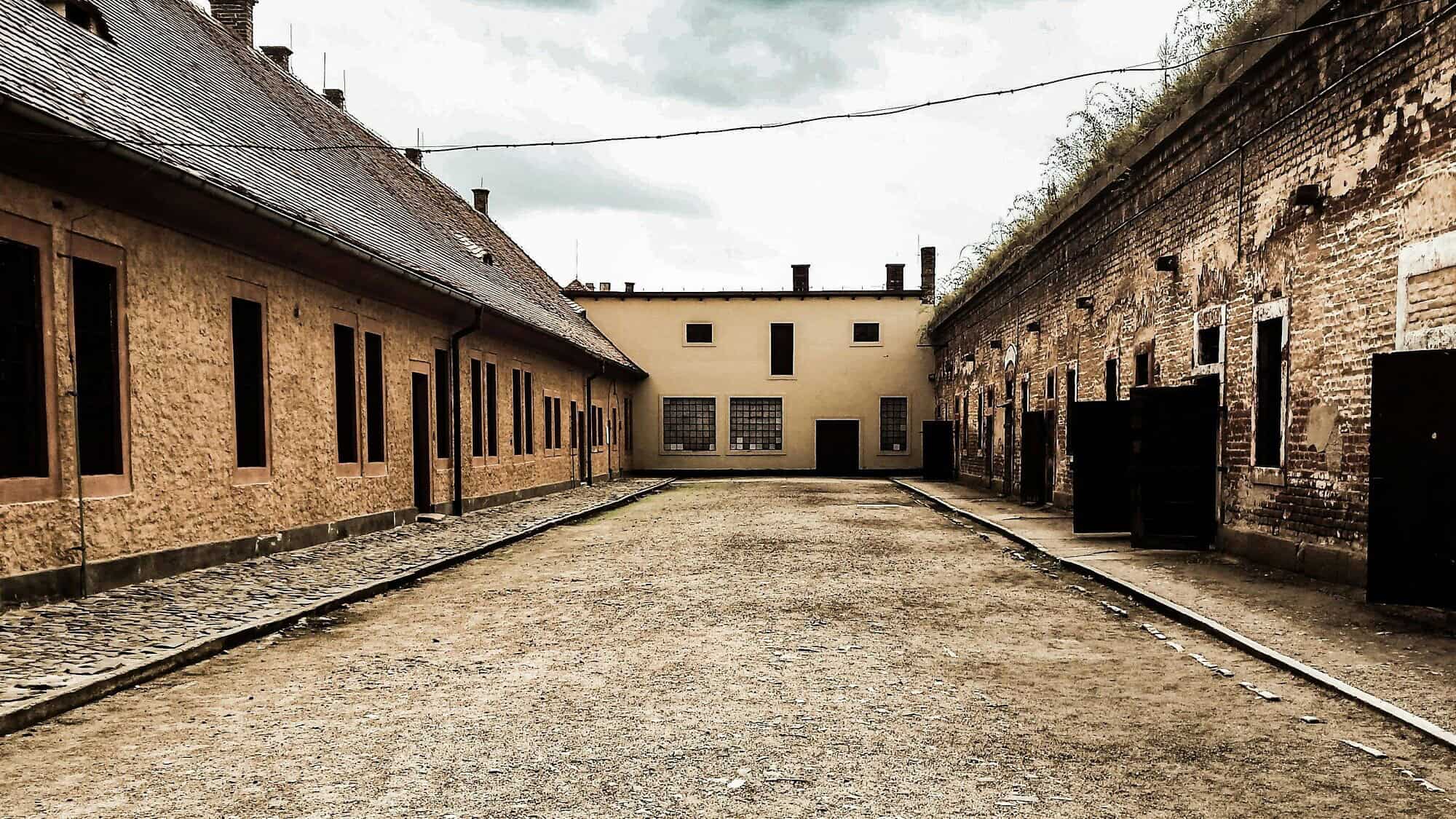 Abandoned buildings on the grounds of the former Theresienstadt concentration camp. Credit: Claudia Zuidema/Pexels.