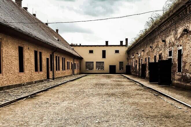 Abandoned buildings on the grounds of the former Theresienstadt concentration camp. Credit: Claudia Zuidema/Pexels.