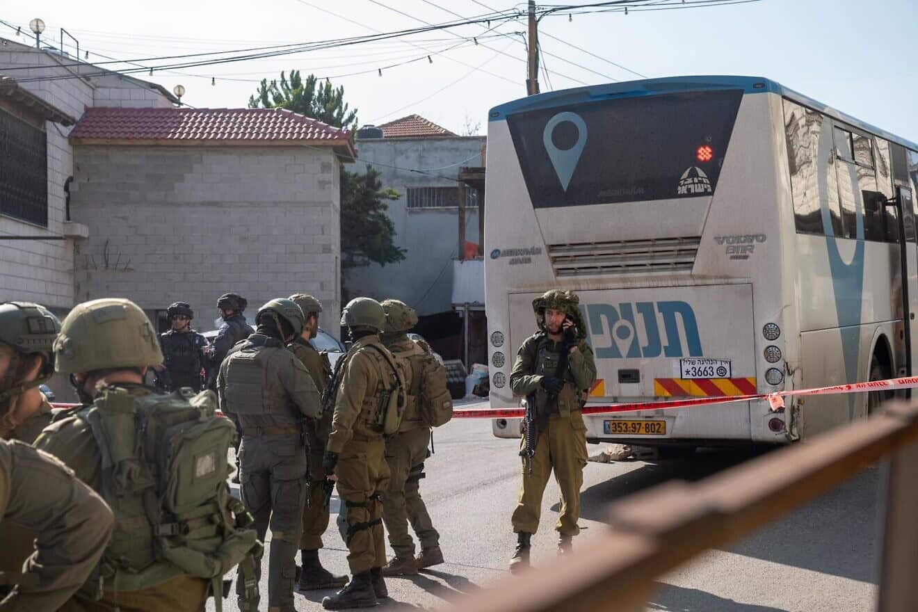 Israeli soldiers at the scene of a terrorist attack adjacent to Al Funduq in northern Samaria, on Jan. 6, 2025. Credit: IDF.