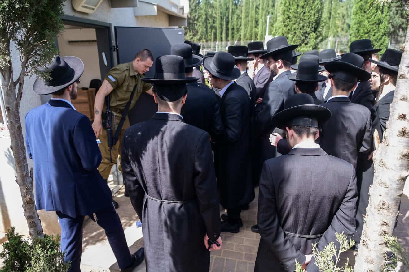 Haredi Jews arrive to the IDF Recruitment Center at Tel Hashomer in central Israel on March 28, 2024. Photo by Avshalom Sassoni/Flash90.