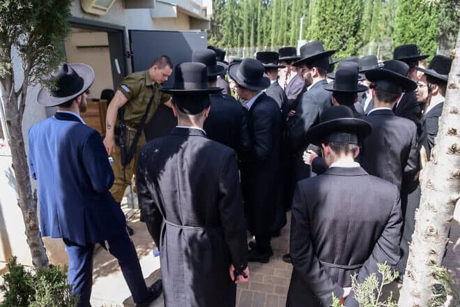 Haredi Jews arrive to the IDF Recruitment Center at Tel Hashomer in central Israel on March 28, 2024. Photo by Avshalom Sassoni/Flash90.