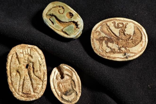 Egyptian-style scarabs with additional cultural influences found at a tomb complex in Israel's Negev Desert are evidence of encounters between different peoples, researchers say. Credit: Emil Aladjem/Israel Antiquities Authority.