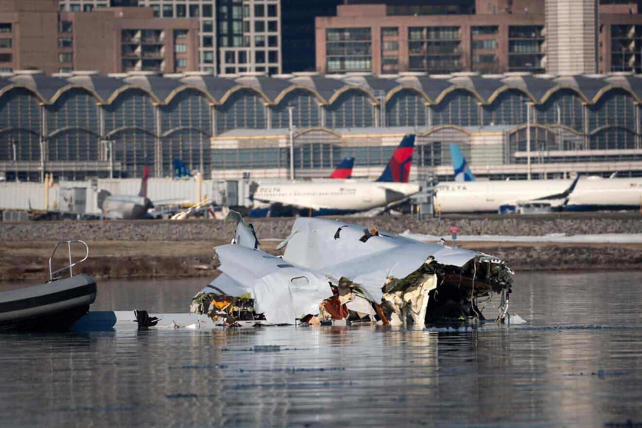 Th U.S. Coast Guard investigates aircraft wreckage on the Potomac River, near Ronald Reagan Washington National Airport outside Washington, D.C., on Jan. 30, 2025. Photo by Petty Officer 1st Class Brandon Giles/U.S. Coast Guard via Getty Images.