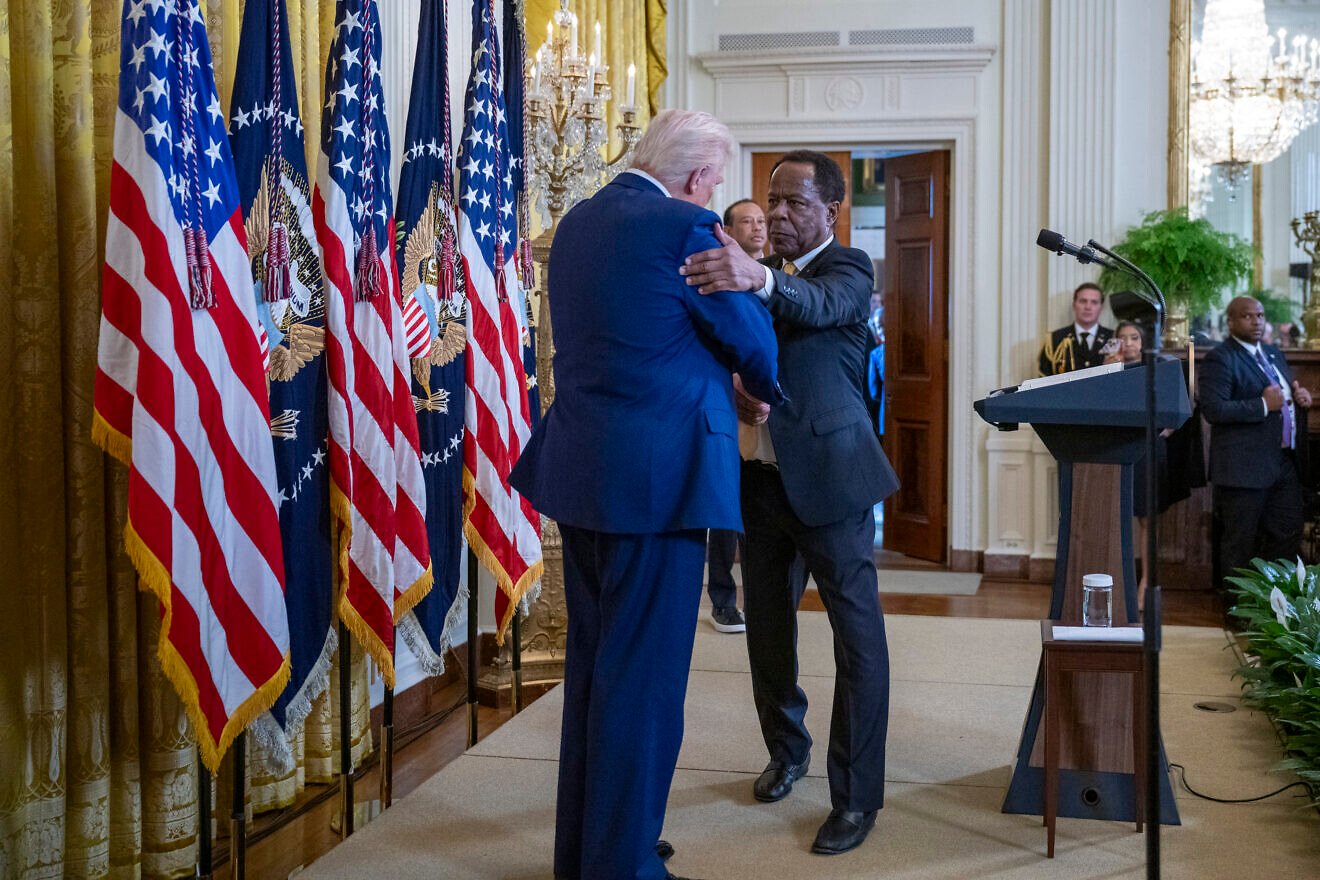 Leo Terrell, senior counsel to the assistant U.S. attorney general for civil rights, speaks with U.S. President Donald Trump at a reception honoring Black History Month in the East Room of the White House, Feb. 20, 2025. Photo by Molly Riley/White House.