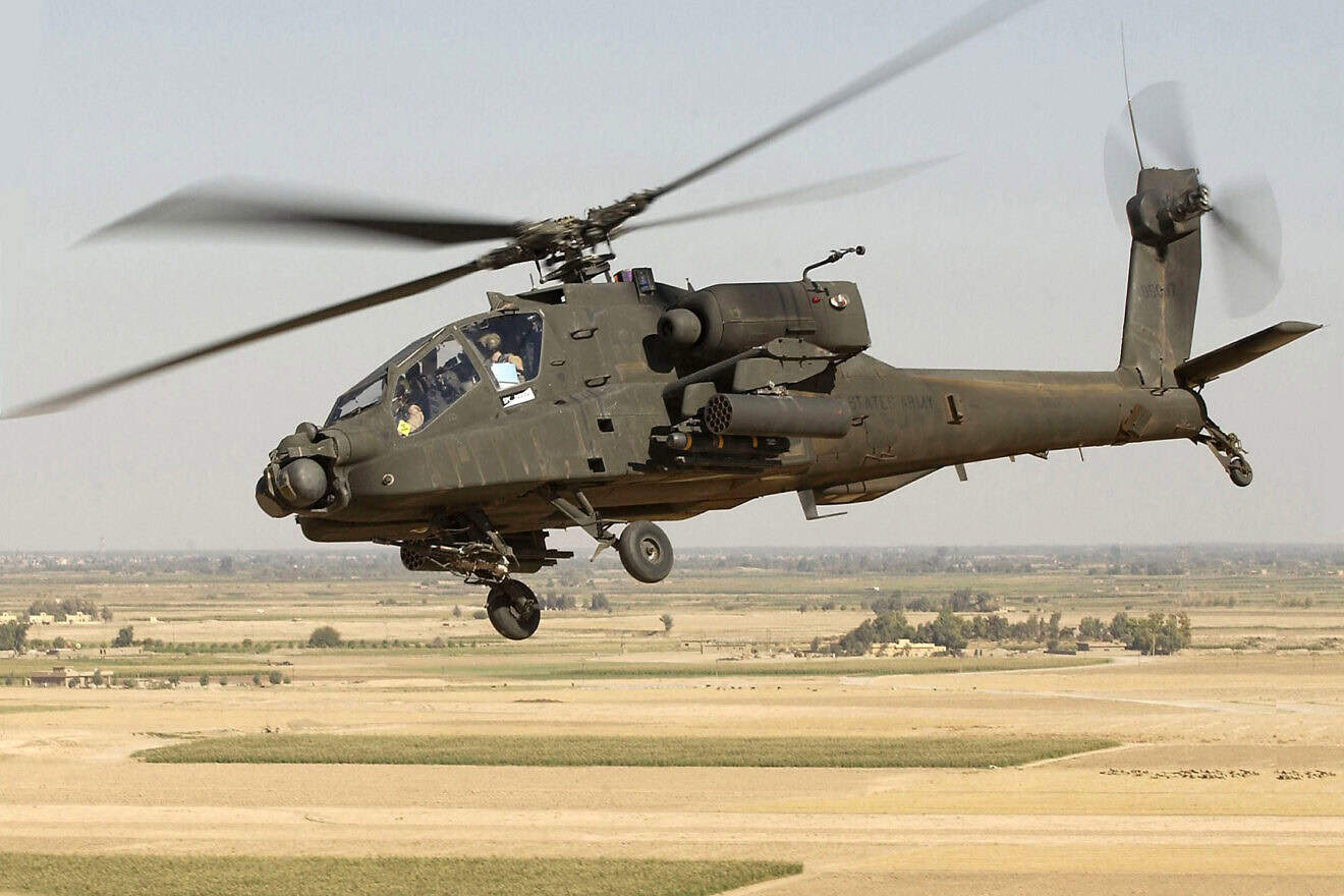 A U.S. Army AH-64D Longbow Apache, 1st Battalion, 101st Aviation Regiment, Fort Campbell Ky., provides ground forces with air support from Forward Operating Base Speicher Iraq, Oct. 21, 2005, during Operation Iraqi Freedom. Credit: U.S. Air Force Photo by Tech. Sgt. Andy Dunaway.