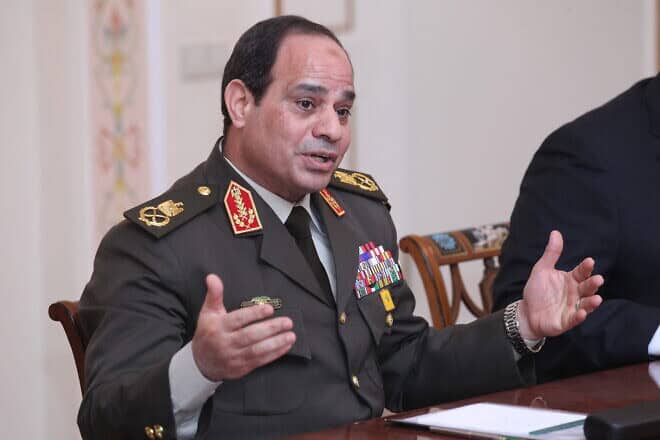 Field Marshal Abdel Fattah el-Sisi, then Egypt's minister of defense and first deputy prime minister, meets with Russian President Vladimir Putin (not pictured) at his Novo-Ogaryovo residence near Moscow on Feb. 13, 2014. Photo by Sasha Mordovets/Getty Images.