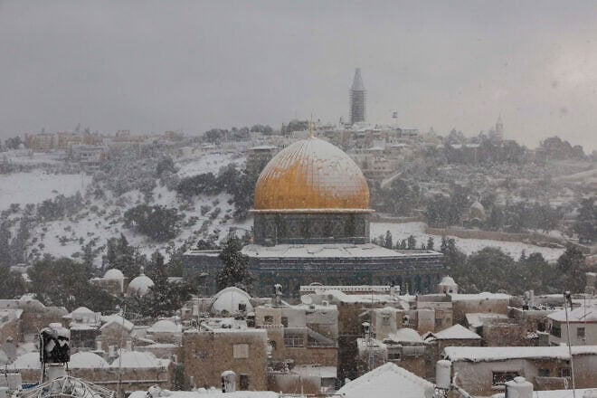 The Temple Mount as seen from the Jewish Quarter in Jerusalem's Old City on a snowy winter day, Dec. 13, 2013. Photo by Yonatan Sindel/Flash90.