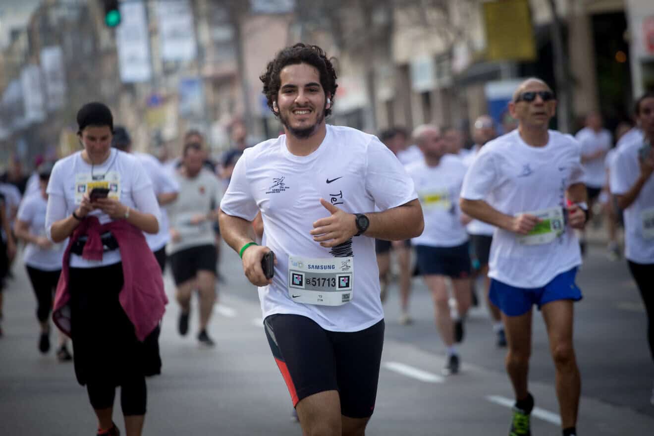 Runners take part in a marathon in Israel's coastal city of Tel Aviv on Feb. 28, 2020. Photo by Miriam Alsterýþ/Flash90.
