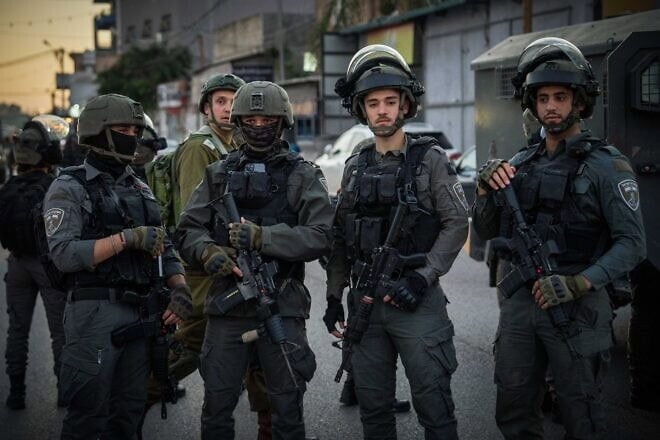 Israeli security forces guard the scene where three Israelis were murdered in the village of al-Funduq in Samaria, Jan. 6, 2025. Photo by Erik Marmor/Flash90.