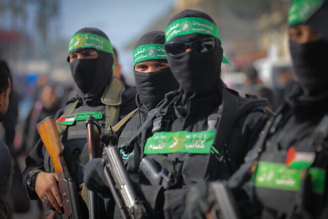 Hamas terrorists at the funeral of Hamas council member Ghazi Abu Tamaa, in Al-Hajj Musa Mosque in Khan Yunis in Gaza, Feb. 4, 2025. Photo by Ali Hassan/Flash90.