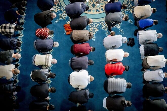 Muslim worshippers perform the morning prayers at the Ulu Mosque in Utrecht, the Netherlands, on the first day of Eid al-Adha, June 16, 2024. Photo by Robin Utrecht/ANP/AFP via Getty Images.