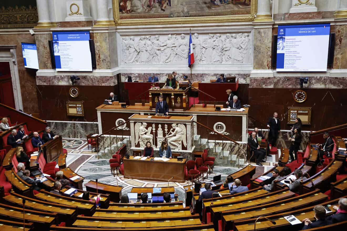 France's Minister of Overseas Manuel Valls (C) addresses the French National Assembly in Paris, Jan. 20, 2025. Photo by Ludovic Marin/AFP via Getty Images.