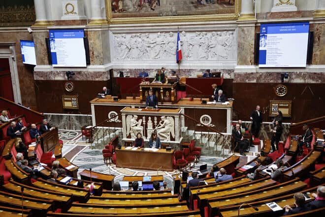 France's Minister of Overseas Manuel Valls (C) addresses the French National Assembly in Paris, Jan. 20, 2025. Photo by Ludovic Marin/AFP via Getty Images.