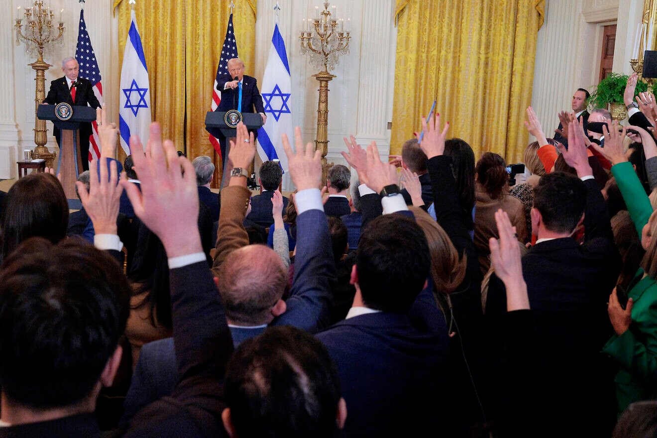 Reporters raise hands to ask questions as Israeli Prime Minister Benjamin Netanyahu and U.S. President Donald Trump speak during a joint press conference held in the East Room of the White House in Washington, D.C., on Feb. 4, 2025. Photo by Chip Somodevilla/Getty Images.