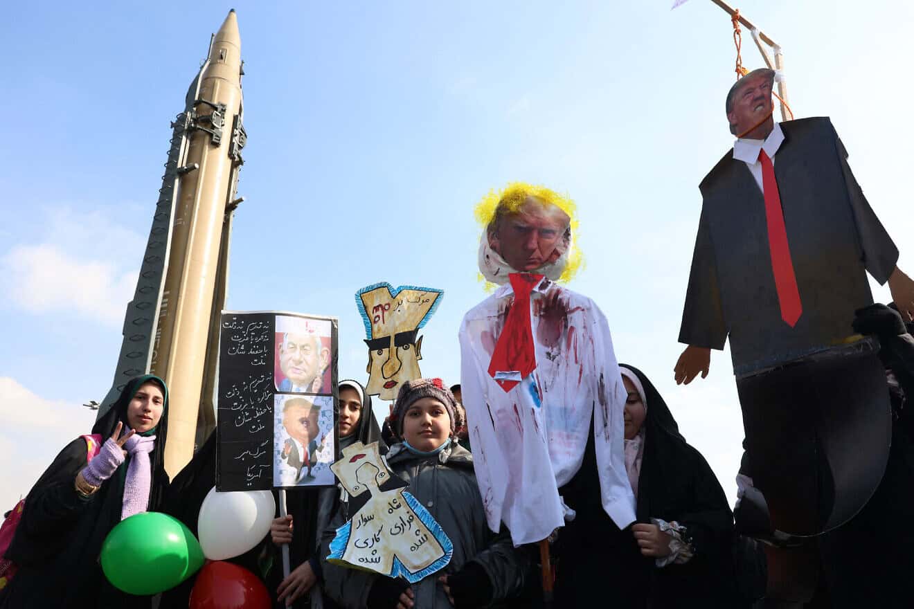 Iranians carry an effigy of U.S. President Donald Trump during a gathering to mark the 46th anniversary of the Islamic Revolution in front of the Azadi Tower in Tehran on Feb. 10, 2025. Photo by AFP via Getty Images.