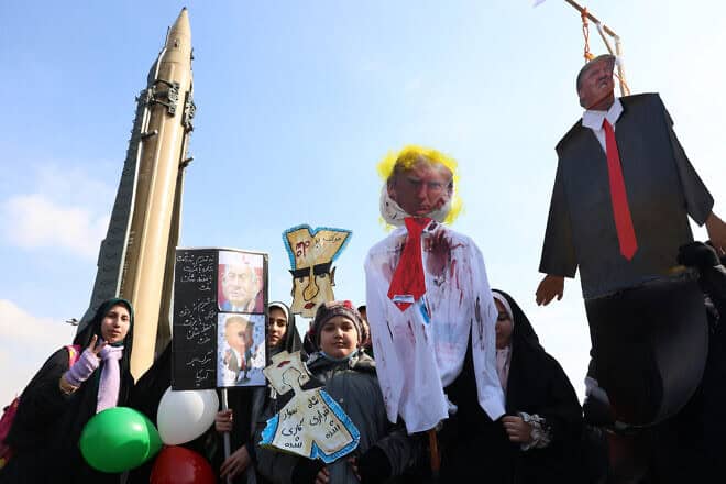 Iranians carry an effigy of U.S. President Donald Trump during a gathering to mark the 46th anniversary of the Islamic Revolution in front of the Azadi Tower in Tehran on Feb. 10, 2025. Photo by AFP via Getty Images.