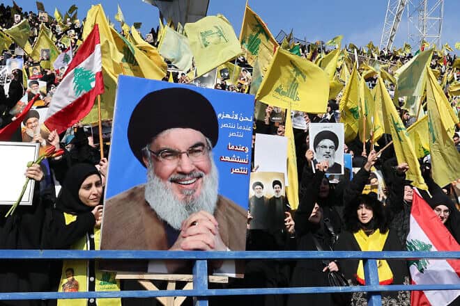 Mourners attend the funeral of slain Hezbollah terror leader Hassan Nasrallah at the Camille Chamoun Sports City Stadium on the outskirts of Beirut, Feb. 23, 2025. Photo by Anwar Amro/AFP via Getty Images.