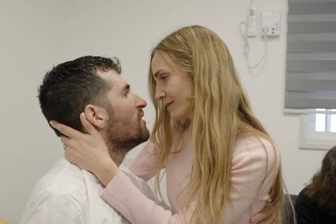 Released hostage Sagui Dekel-Chen reunites with his wife, Avital, and parents, Neomit and Jonathan, at the IDF's Re'im camp on the Gaza border, Feb. 15, 2025. Credit: IDF Spokesperson's Office.