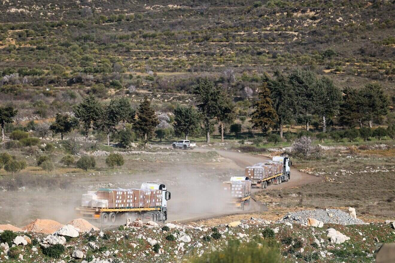 Israeli trucks delivering aid to Druze communities in southern Syria in a photo published on March 13, 2025. Credit: Sivan Shachor/GPO.