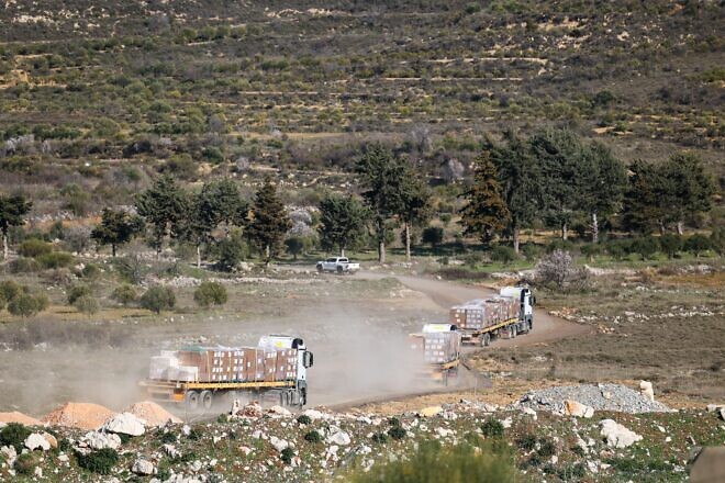 Israeli trucks delivering aid to Druze communities in southern Syria in a photo published on March 13, 2025. Credit: Sivan Shachor/GPO.