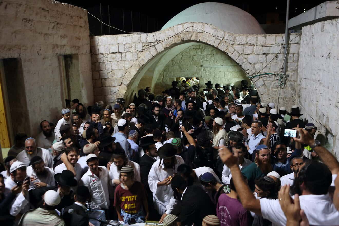 Hundreds of Orthodox Jewish men pray near the compound of Joseph's Tomb in the Samaria city of Nablus (Shechem), June 10, 2013. Photo by Yaakov Naumi/Flash90.