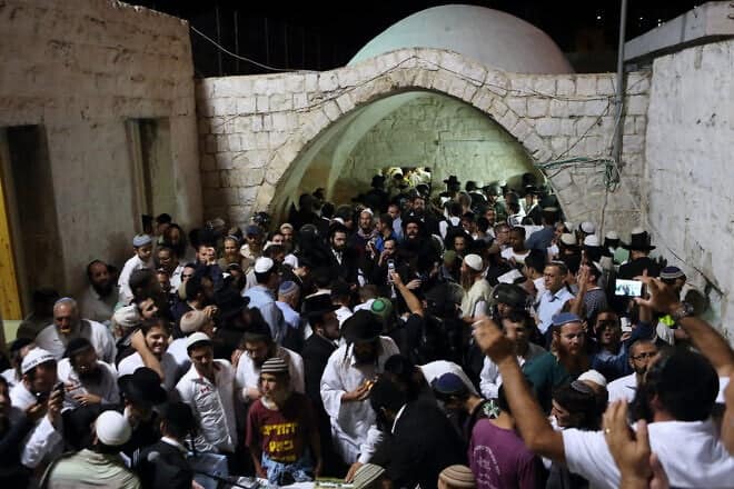 Hundreds of Orthodox Jewish men pray near the compound of Joseph's Tomb in the Samaria city of Nablus (Shechem), June 10, 2013. Photo by Yaakov Naumi/Flash90.