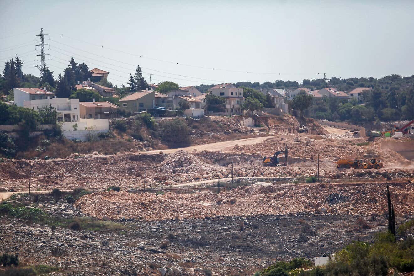 Construction work on new housing in the Jewish community of Kiryat Netafim, south of the Samaria city of Nablus, July 20, 2022. Photo by Nasser Ishtayeh/Flash90.