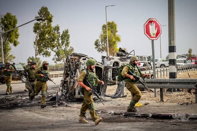 Israeli soldiers near the entrance to Kibbutz Be'eri on Oct. 9, 2023. Photo by Yossi Zamir/Flash90.
