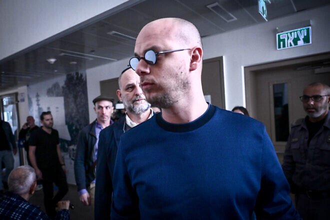 Eli Feldstein, accused of leaking classified documents, arrives to a court hearing at the District Court in Tel Aviv, Jan. 14, 2025. Photo by Avshalom Sassoni/Flash90.