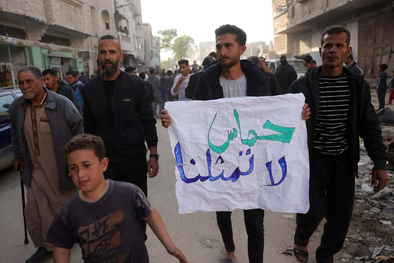 "Hamas does not represent us," the banner reads during a protest in Beit Lahia, the northern Gaza Strip, calling an end to the war with Israel, March 26, 2025. Credit: AFP via Getty Images.