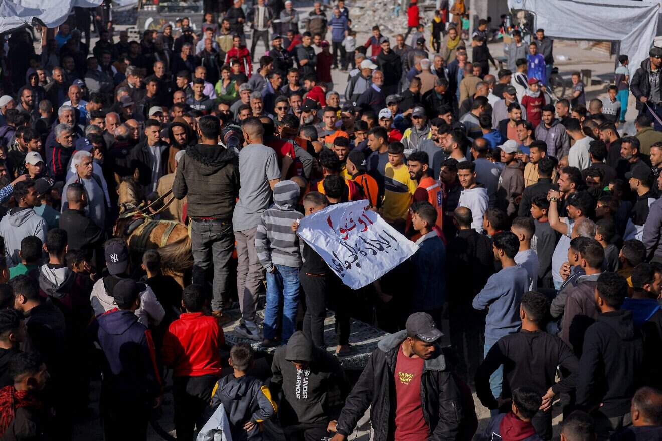 Palestinians chant anti-Hamas slogans during a protest in Beit Lahia in the northern Gaza Strip, March 26, 2025. Photo by Youssef Alzanoun/Middle East Images/Middle East Images/AFP via Getty Images.