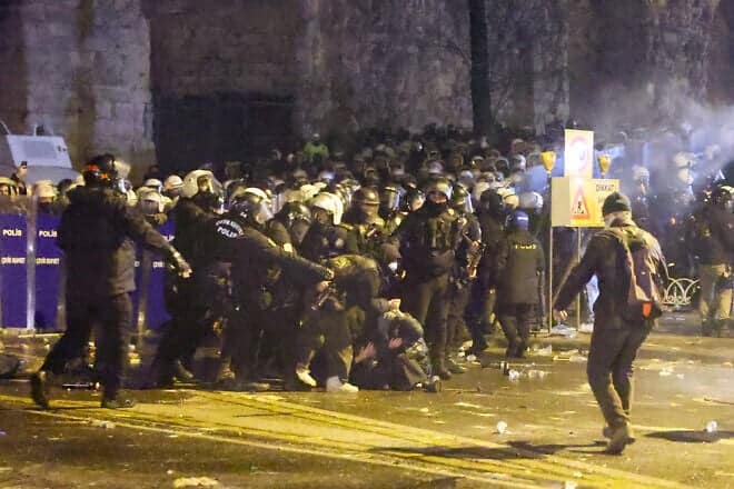 Police confront protesters as thousands of people demonstrate in front of the Istanbul Metropolitan Municipality in Sarachane Square against the arrest of Mayor Ekrem İmamoğlu, March 21, 2025. Photo by Sercan Ozkurnazli/dia images via Getty Images.