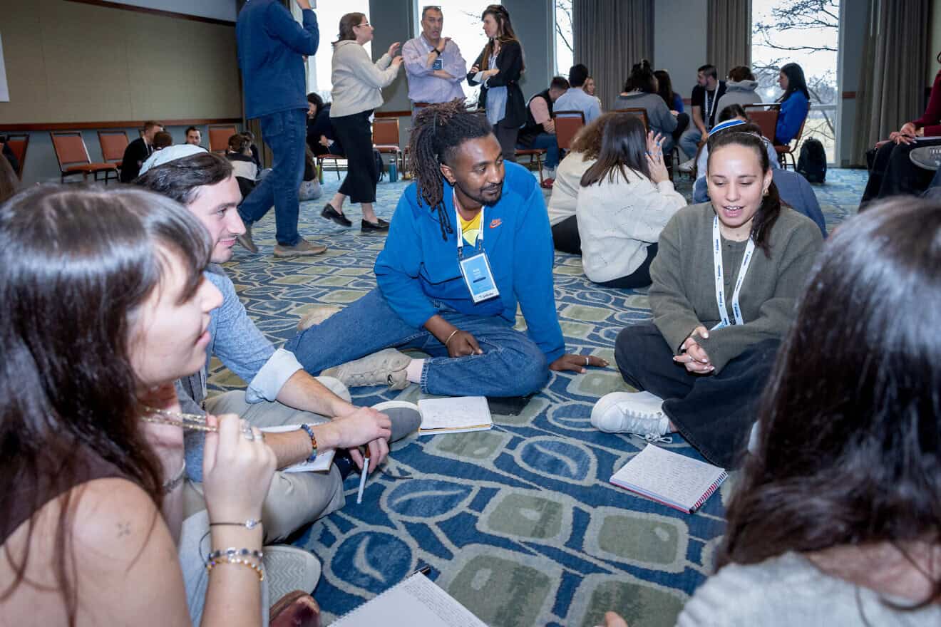 Birthright Israel Fellows process their day’s learning together. Credit: Courtesy of iCenter.