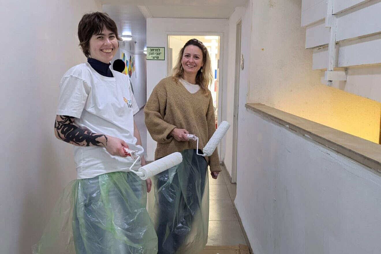 Members of the Olim Shalav volunteer group work on a service project in Israel. Credit: Courtesy of Yahel.