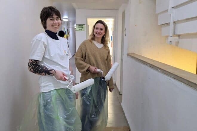 Members of the Olim Shalav volunteer group work on a service project in Israel. Credit: Courtesy of Yahel.