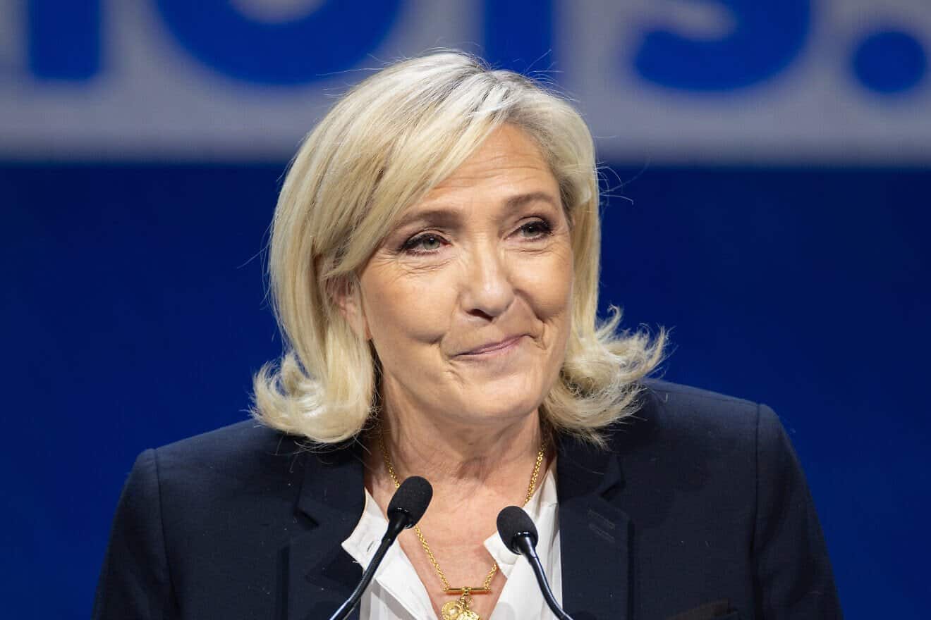 Marine Le Pen delivers a speech in Madrid on Feb. 8, 2025. Credit: Vox España via Wikimedia Commons.