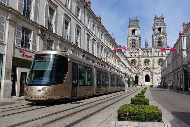 A tram travels down  Jeanne-d'Arc Street in Orléans, France, on June 24, 2018. Credit: Bmazerolles via Wikimedia Commons.