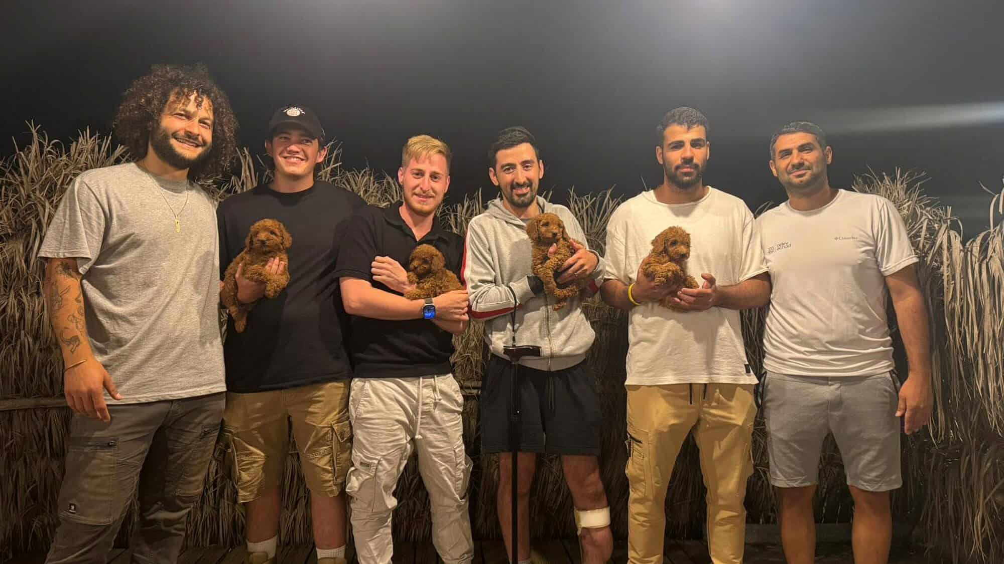 Veterans of the Israel Defense Forces with trainee pups in the Dogs 4 Soldiers program. Credit: Courtesy of Liran Dimri/Belev Echad.