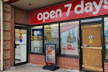 The front doors of the Judaica shop Shainee’s Gift Selections, the My Zaidy’s Pizza and a pharmacy that is part of the chain Shoppers Drug Mart in Thornhill, in the Toronto area, were smashed in and the Jewish-owned stores robbed on April 19, the second to last day of Passover. Photographed on April 21, 2025. Photo by Dave Gordon.