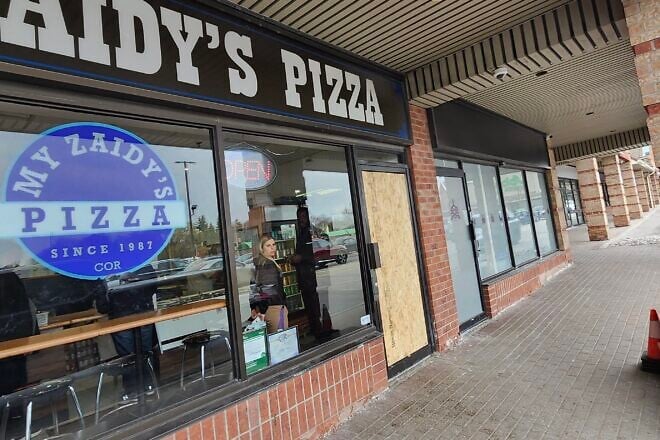 The front doors of the Judaica shop Shainee’s Gift Selections, the My Zaidy’s Pizza and a pharmacy that is part of the chain Shoppers Drug Mart in Thornhill, in the Toronto area, were smashed in and the Jewish-owned stores robbed on April 19, the second to last day of Passover. Photographed on April 21, 2025. Photo by Dave Gordon.
