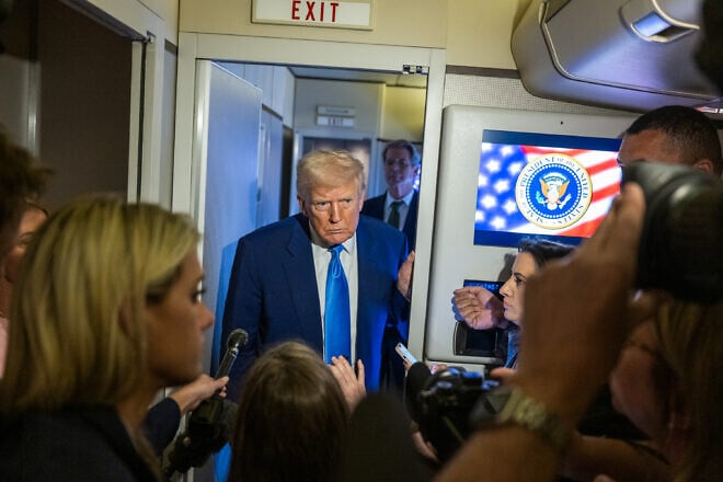 U.S. President Donald Trump holds a press conference on Air Force One, April 6, 2025. Credit: Molly Riley/White House.