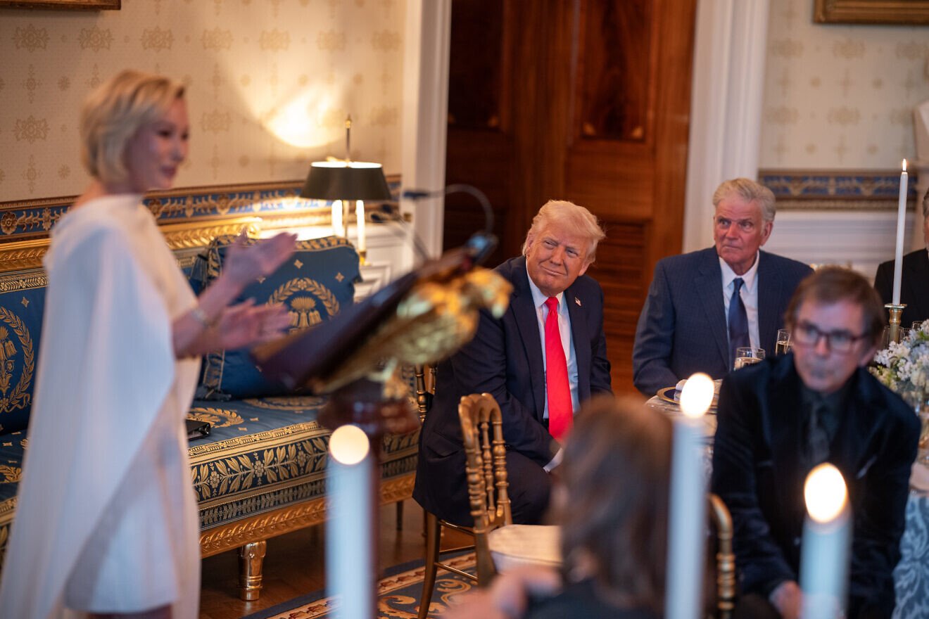 Pastor Paula White-Cain offers a prayer during an Easter service and dinner in the White House Blue Room, as U.S. President Donald Trump looks on, April 16, 2025. Photo by Joyce N. Boghosian/White House.