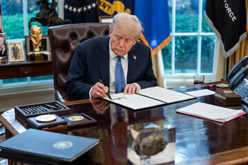 U.S. President Donald Trump signs executive orders in the Oval Office, April 24, 2025. Credit: Abe McNatt/White House.