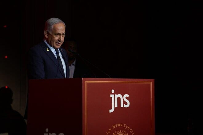 Israeli Prime Minister Benjamin Netanyahu addresses the inaugural JNS International Policy Summit in Jerusalem, April 27, 2025. Photo by Hillel Maeir.